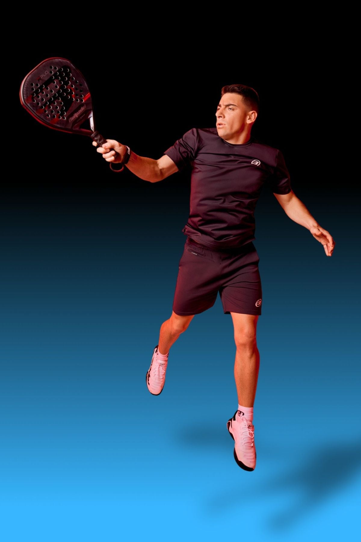Top Game padel player performing a powerful jump shot with Bullpadel racket
